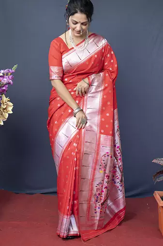 Red silk blend saree with silver zari booti & traditional floral pallu