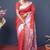 Red silk blend saree with silver zari booti & traditional floral pallu