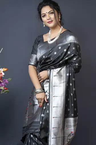 Black silk blend saree with silver zari booti & traditional floral pallu