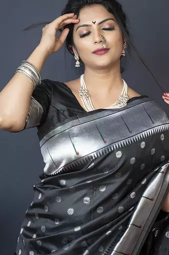 Black silk blend saree with silver zari booti & traditional floral pallu
