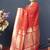 Red banarasi silk blend saree with silver zari border & woven pallu