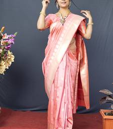 Baby pink banarasi silk blend saree with silver zari border & woven pallu