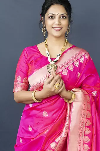 Rani pink banarasi silk blend saree with silver zari border & woven pallu