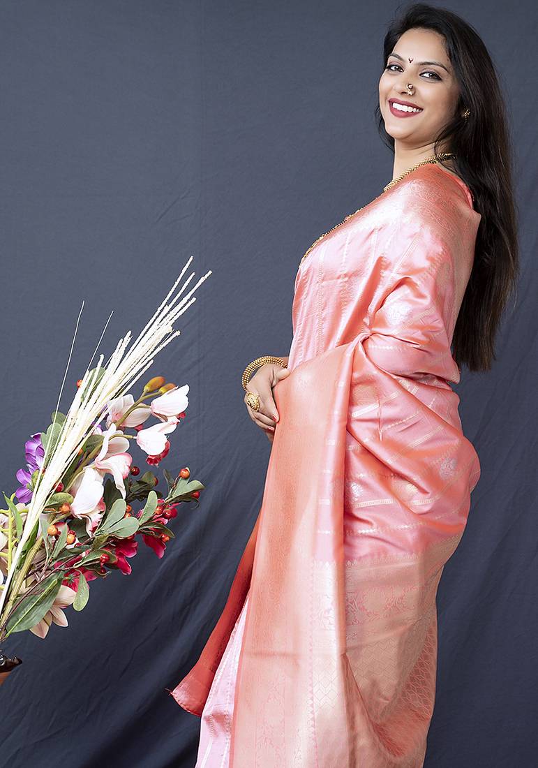 Baby pink banarasi silk blend saree with zari border & woven pallu