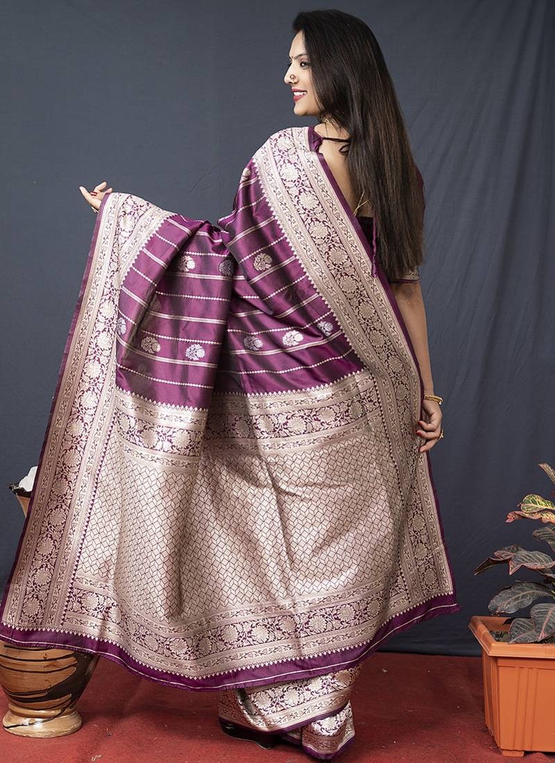 Wine banarasi silk blend saree with zari border & woven pallu