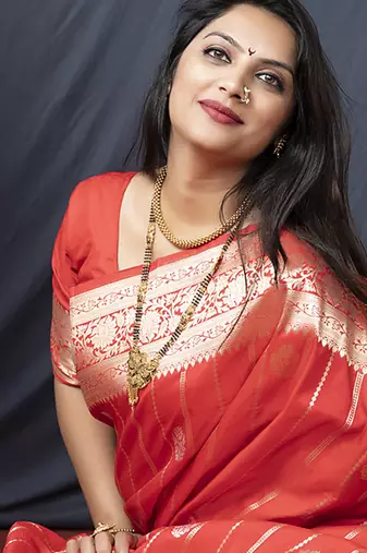 Red banarasi silk blend saree with zari border & woven pallu