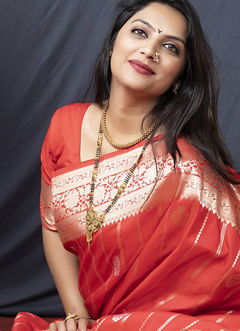 Red banarasi silk blend saree with zari border & woven pallu