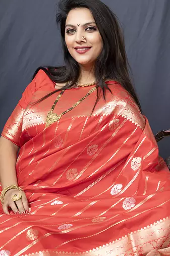 Red banarasi silk blend saree with zari border & woven pallu