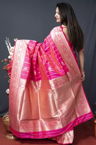 Rani pink banarasi silk blend saree with zari border & woven pallu