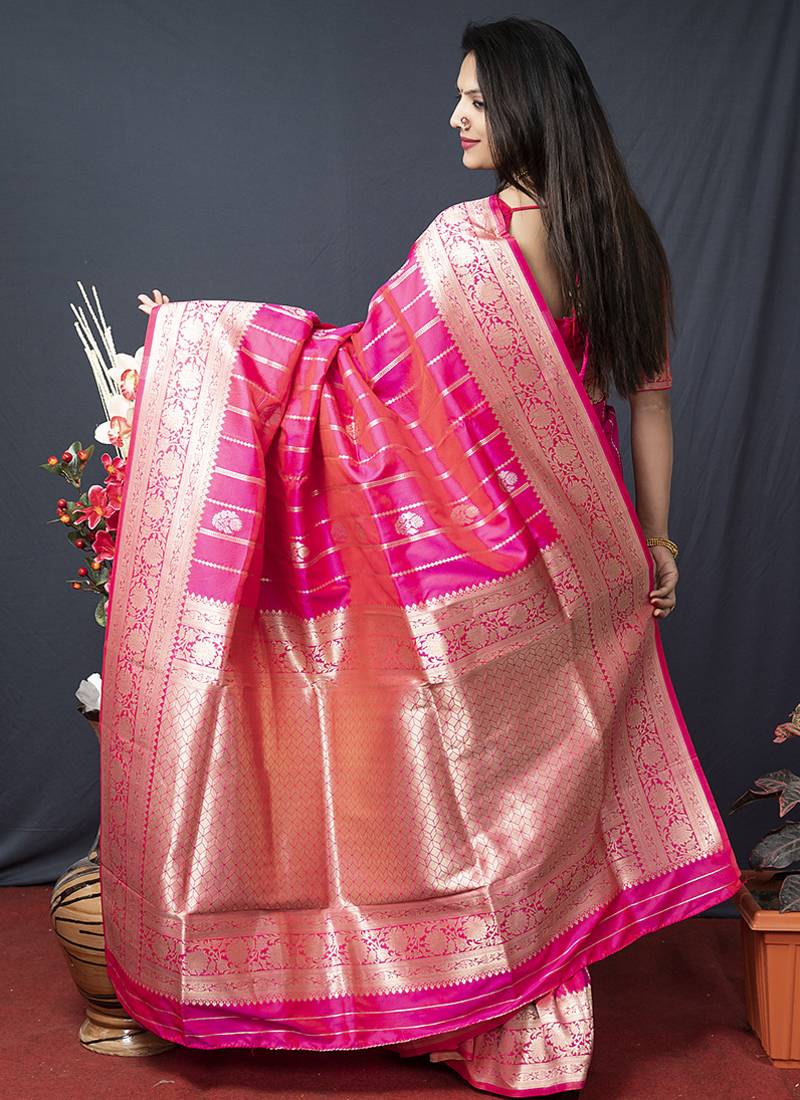 Rani pink banarasi silk blend saree with zari border & woven pallu