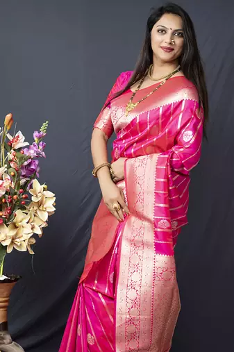 Rani pink banarasi silk blend saree with zari border & woven pallu