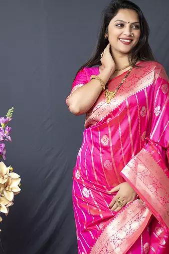 Rani pink banarasi silk blend saree with zari border & woven pallu