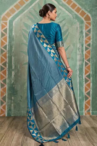 teal blue silk blend saree with geometric gold border | women's party wear