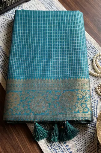 teal blue silk blend saree with geometric gold border | women's party wear