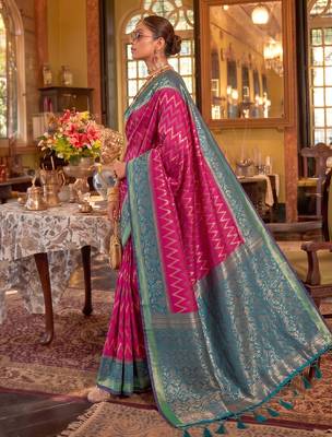 rani pink banarasi silk blend saree with teal border | women's royal wedding attire 2