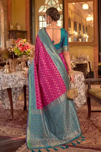 rani pink banarasi silk blend saree with teal border | women's royal wedding attire