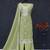 Green embroidered unstitched silk blend  suit material with heavy neck & border mirror work dupatta set