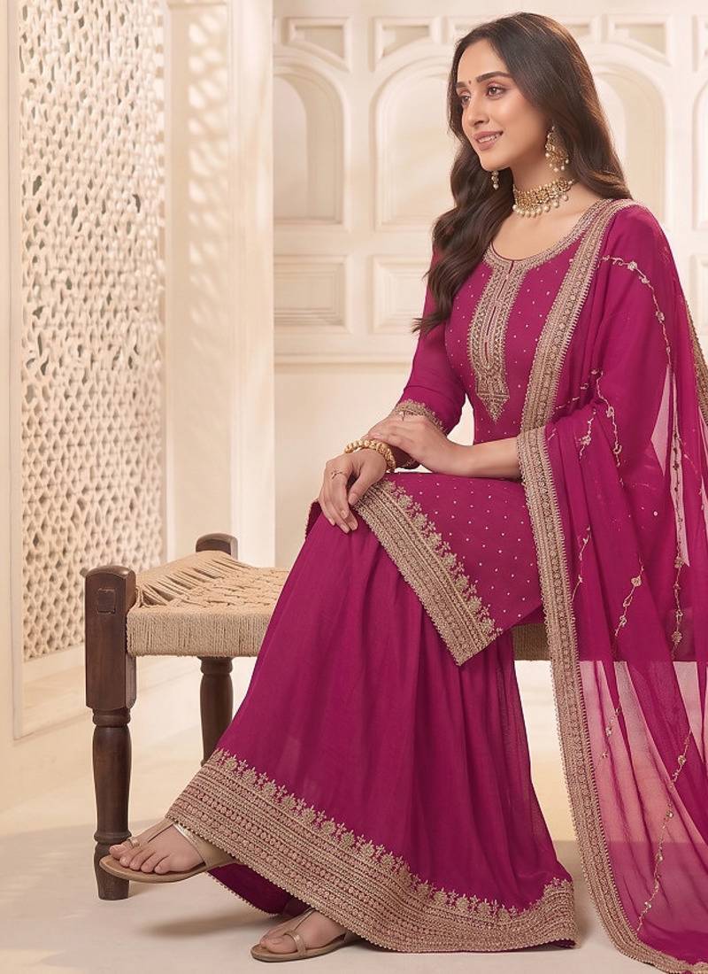 Pink embroidered unstitched salwar suit material with heavy border dupatta