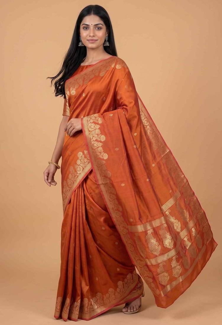 Orange semi silk banarasi  saree with floral zari leaf work