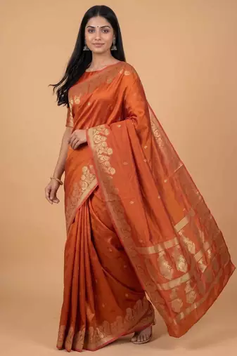 Orange semi silk banarasi  saree with floral zari leaf work
