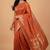 Orange semi silk banarasi  saree with floral zari leaf work