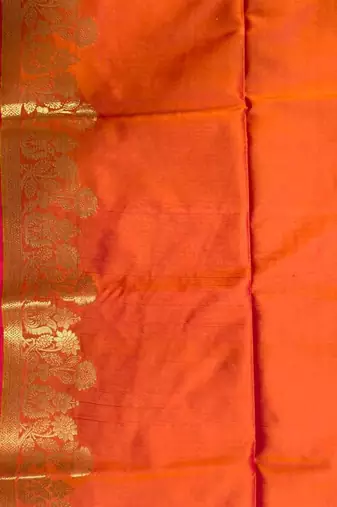 Orange semi silk banarasi  saree with floral zari leaf work