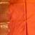 Orange semi silk banarasi  saree with floral zari leaf work