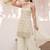 White embroidered strappy kurti sharara set