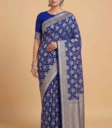  blue banarasi silk blend saree with floral zari & red minakari work