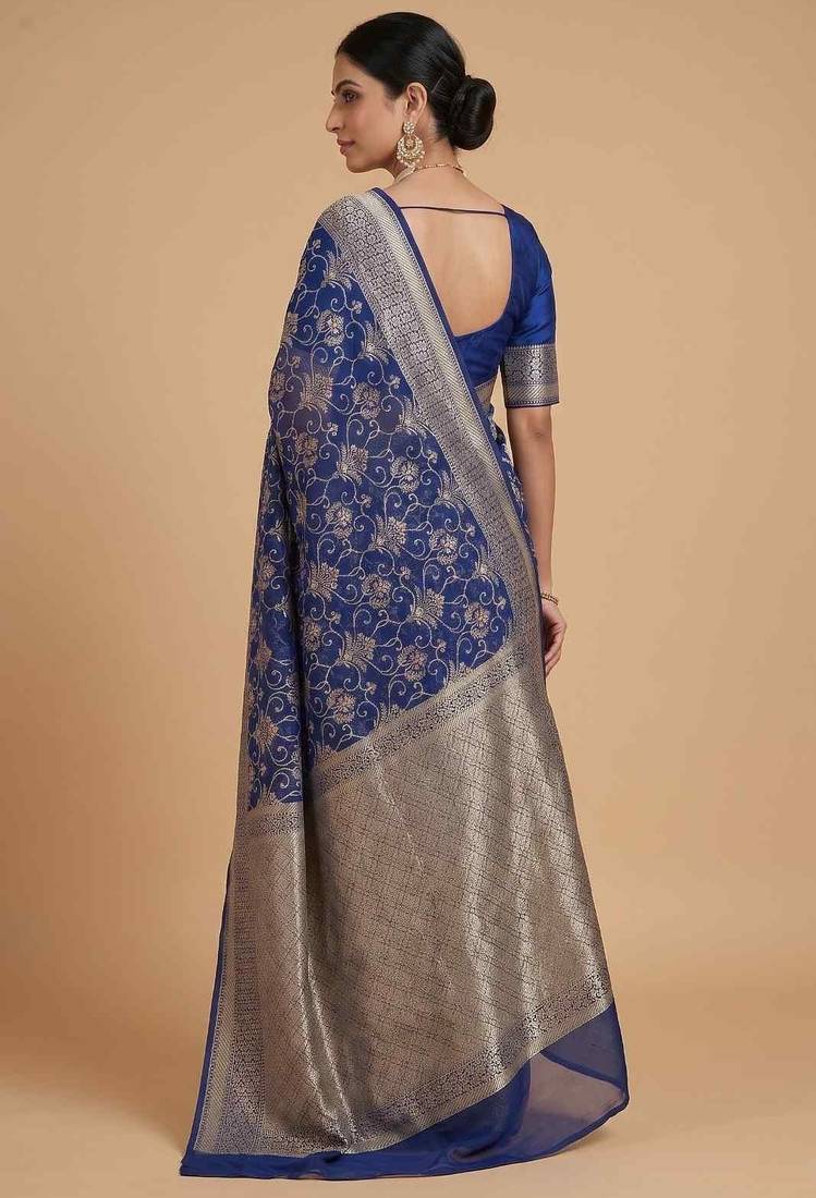  blue banarasi silk blend saree with floral zari & red minakari work
