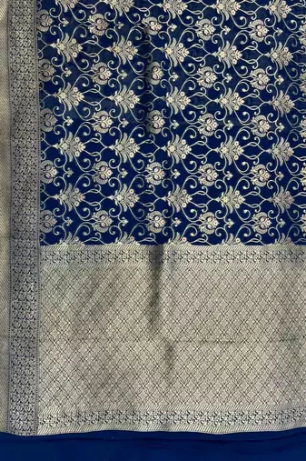  blue banarasi silk blend saree with floral zari & red minakari work