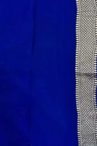  blue banarasi silk blend saree with floral zari & red minakari work