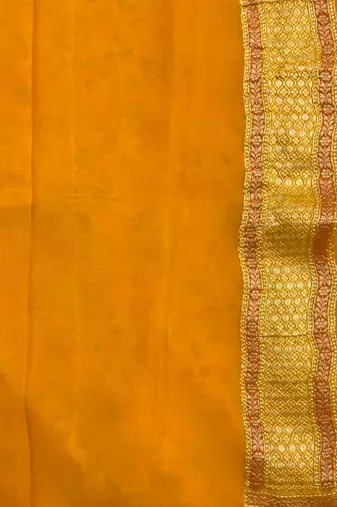 mustard banarasi silk blend saree with floral zari &  minakari work