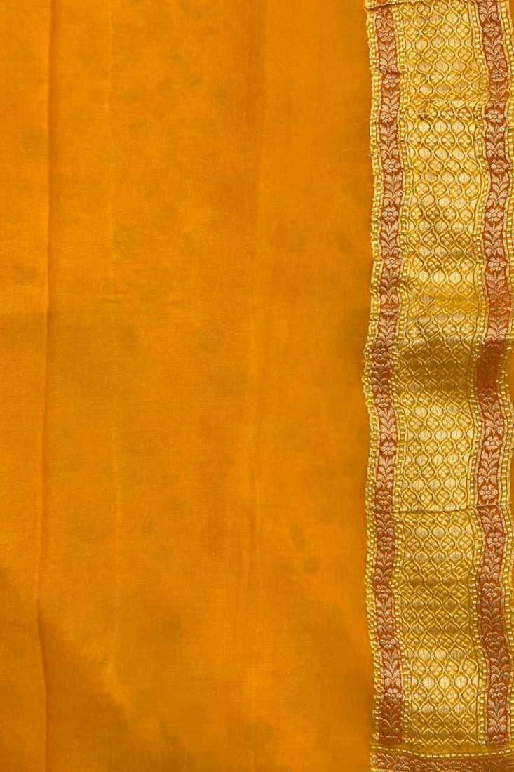 mustard banarasi silk blend saree with floral zari &  minakari work