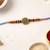 gold plated om designer rakhi with roli chawal & raksha bandhan card