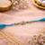 evil eye designer rakhi for brother with roli chawal & raksha bandhan card