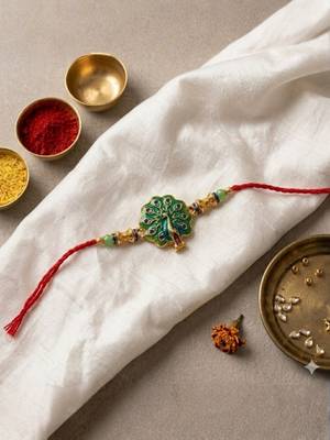 traditional peacock designer rakhi with roli chawal & raksha bandhan card 1