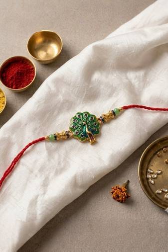 traditional peacock designer rakhi with roli chawal & raksha bandhan card