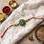 traditional peacock designer rakhi with roli chawal & raksha bandhan card