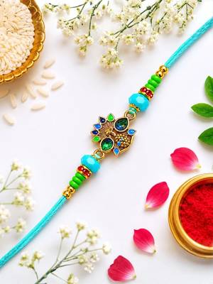 peacock designer rakhi with roli chawal & raksha bandhan card for brother 1