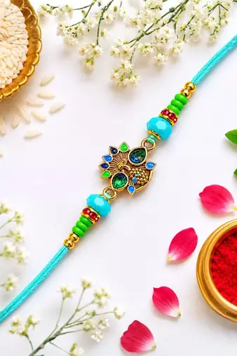 peacock designer rakhi with roli chawal & raksha bandhan card for brother
