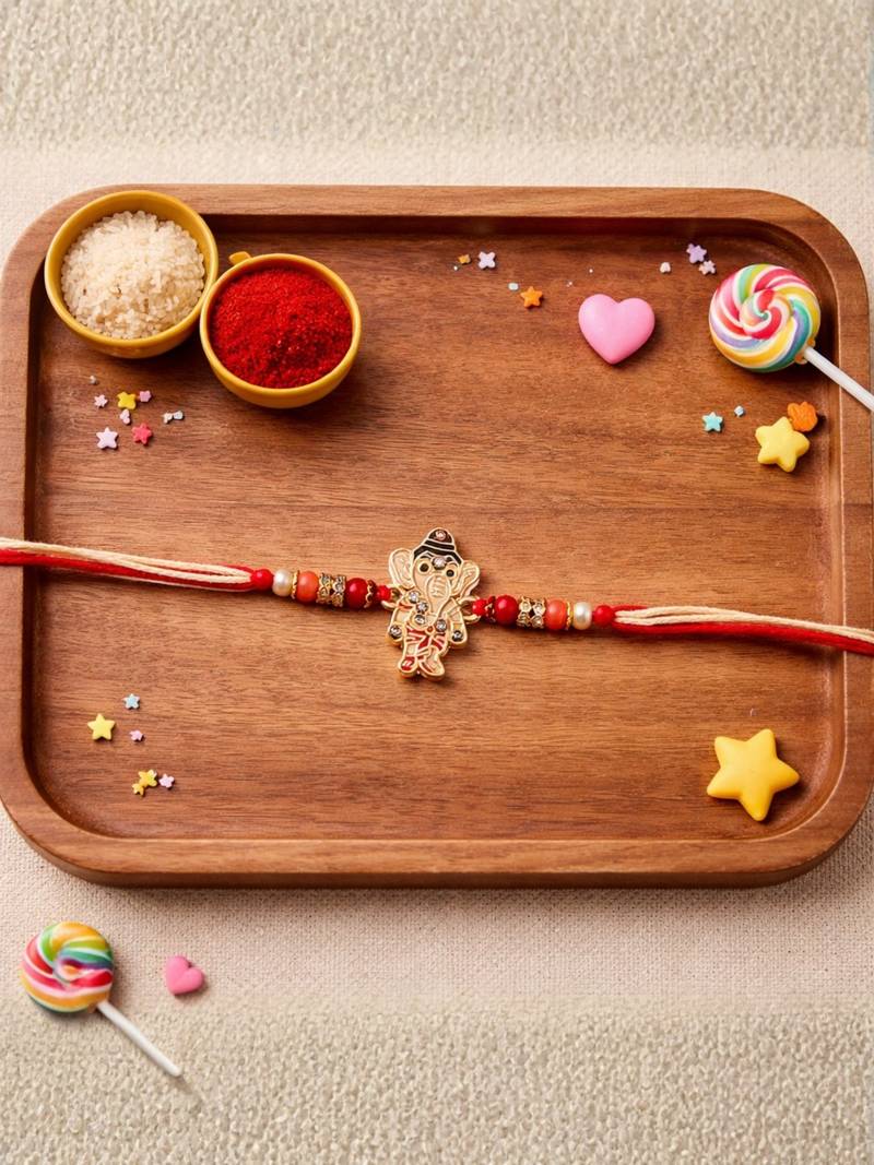 ganesha designer rakhi with roli chawal & raksha bandhan card for brother