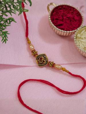 om design bead rakhi with roli chawal & rakshabandhan card 1