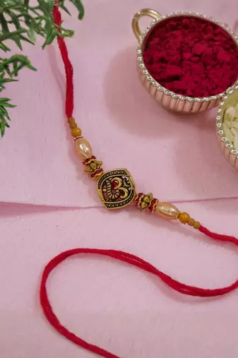 om design bead rakhi with roli chawal & rakshabandhan card