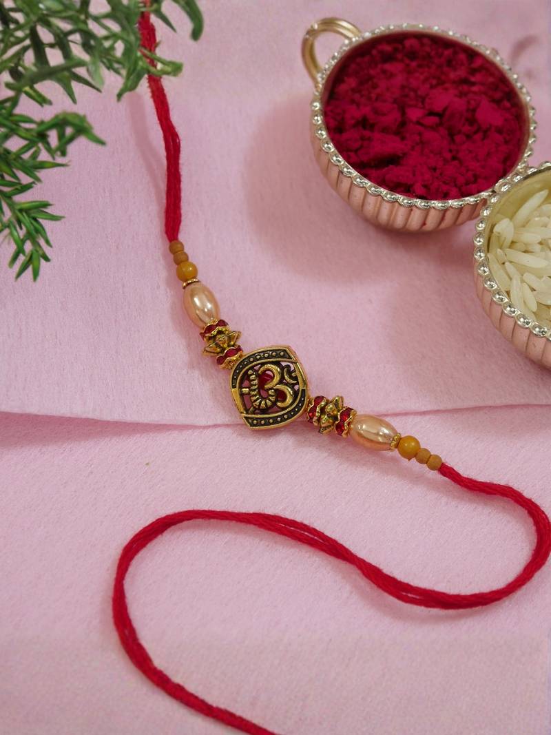 om design bead rakhi with roli chawal & rakshabandhan card