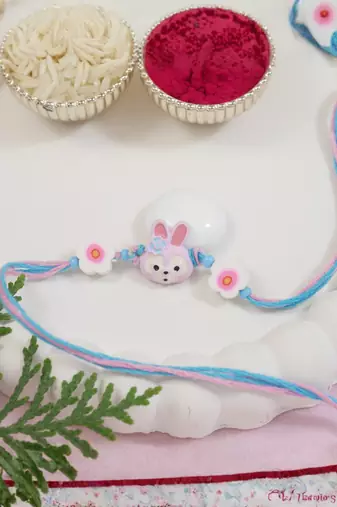 cute kids cartoon rakhi with roli chawal & rakshabandhan card