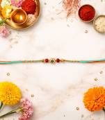 floral meenakari & rudraksha bead rakhi with roli chawal & rakshabandhan card