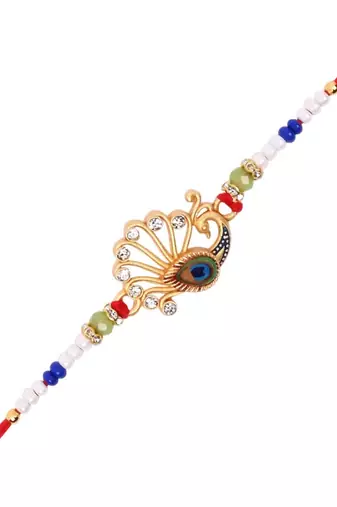 peacock design rakhi with roli chawal and raksha bandhan card