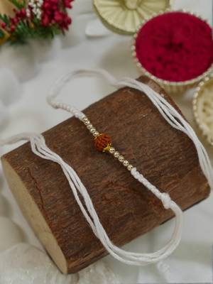 traditional rudraksha rakhi with roli chawal and raksha bandhan card 1