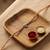 ganesha designer rakhi with roli chawal and raksha bandhan card